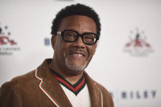 Judge Mathis poses in brown jacket at the May 2023 "Big Fighters, Big Cause" charity boxing night at the Beverly Hilton hotel