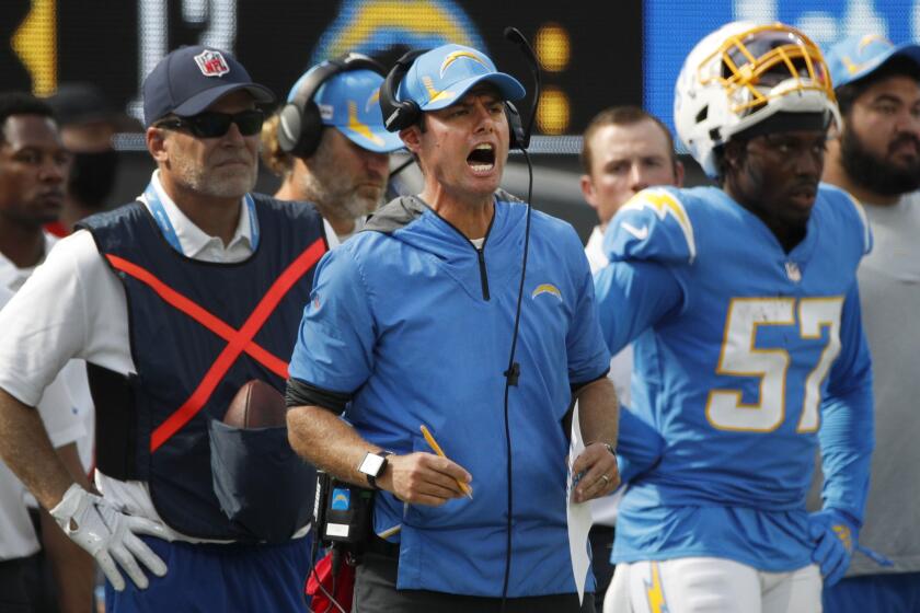 INGLEWOOD, CA - OCTOBER 10, 2021: Los Angeles Chargers head coach Brandon Staley yells instructions.