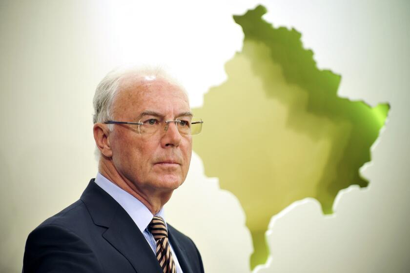 FIFA banned Franz Beckenbauer of Germany from any association with soccer for 90 days after being accused of not cooperating with an investigation into the 2018 and 2022 World Cup bids.