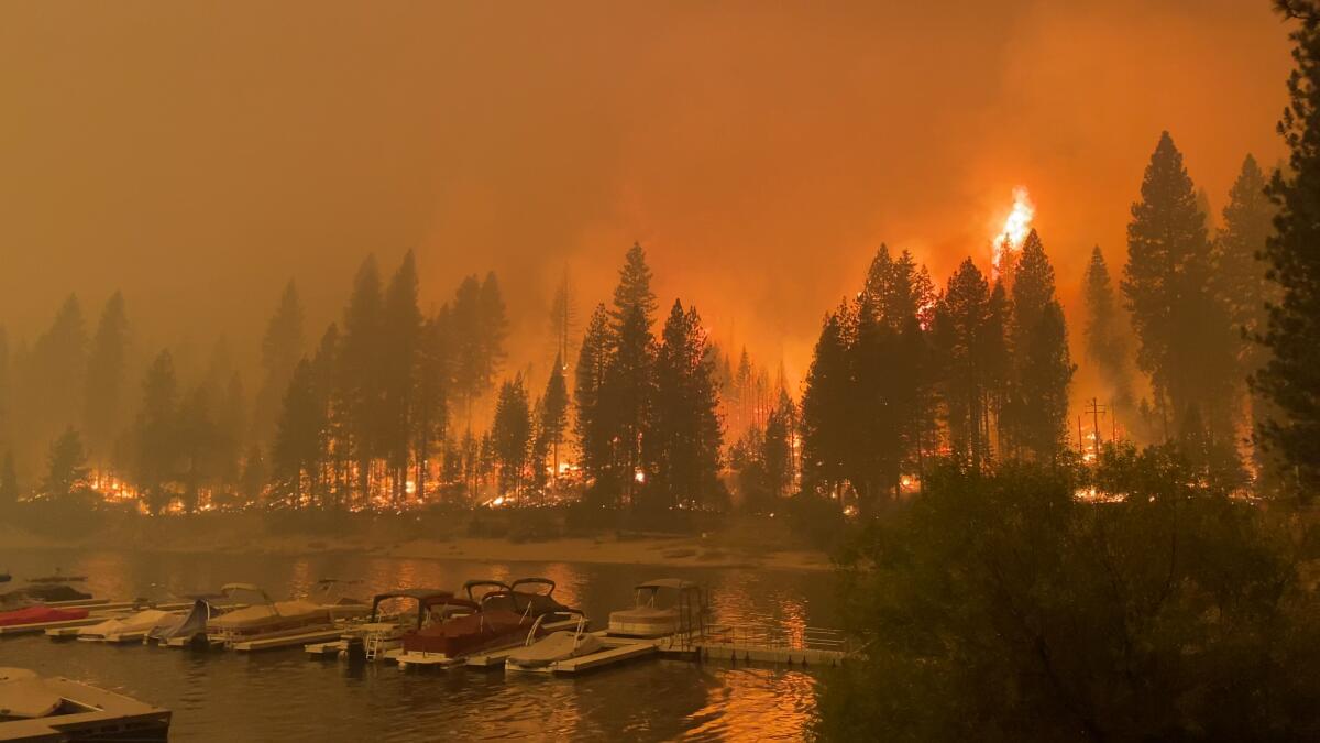 The Creek fire exploded and surrounded Shaver Lake in California, seen here on Sept. 6.