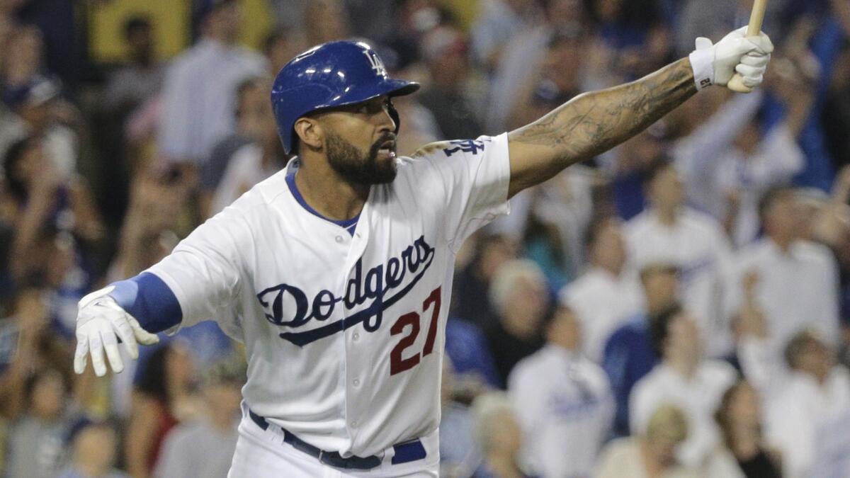 Dodgers outfielder Matt Kemp hits a two-run home run in the seventh inning of a July 29 game against the Atlanta Braves.