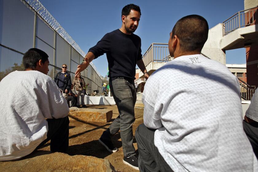 Scott Budnick, center, greets youths at the juvenile hall. At the end of last year, he left his longtime production company to form a new entertainment business that will focus on social justice.