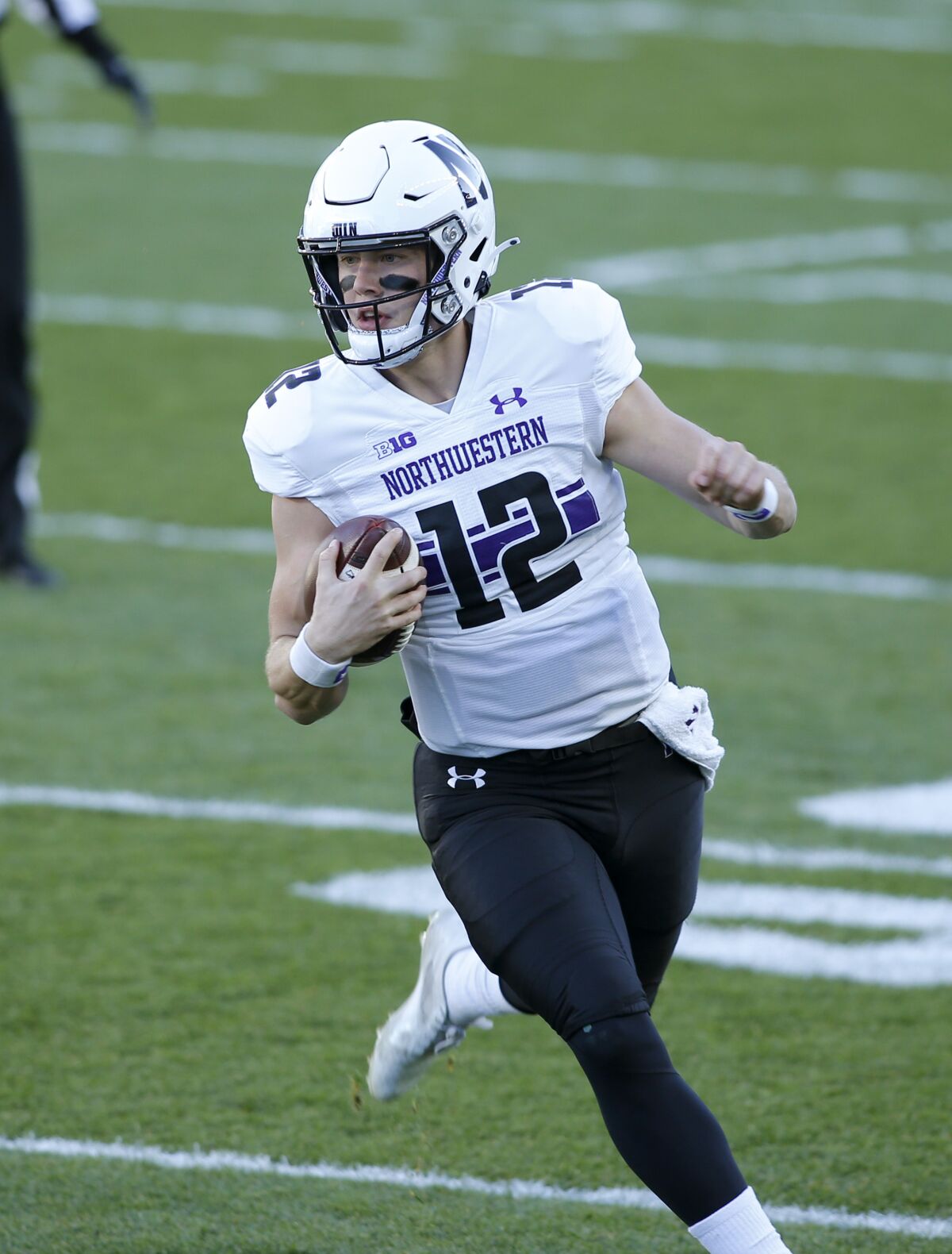 Northwestern quarterback Peyton Ramsey runs on a keeper against Michigan State during the first half of an NCAA college football game, Saturday, Nov. 28, 2020, in East Lansing, Mich. (AP Photo/Al Goldis)