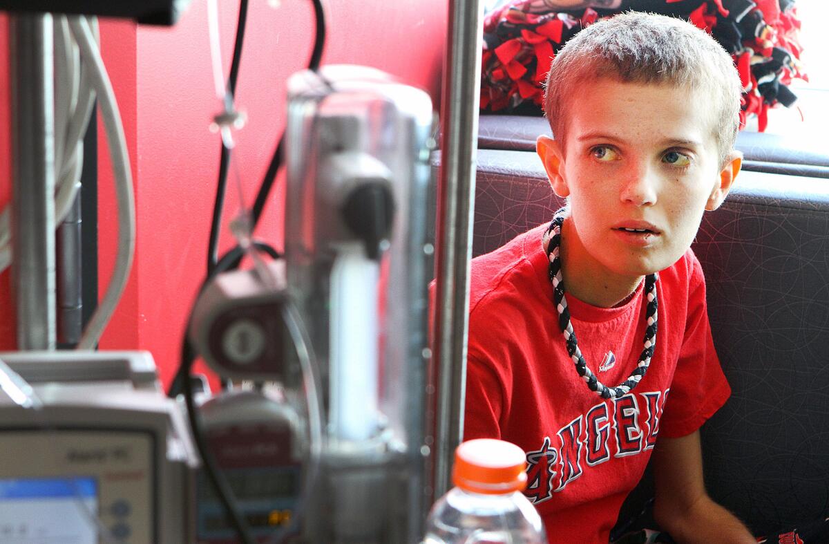 Christopher Wilke, 12, of Burbank, is at Children's Hospital Los Angeles for treatment of a rare disease he is battling on Monday, March 3, 2014. The disease is a a bile duct cancer that is rare for adults, and nearly unheard of for children.