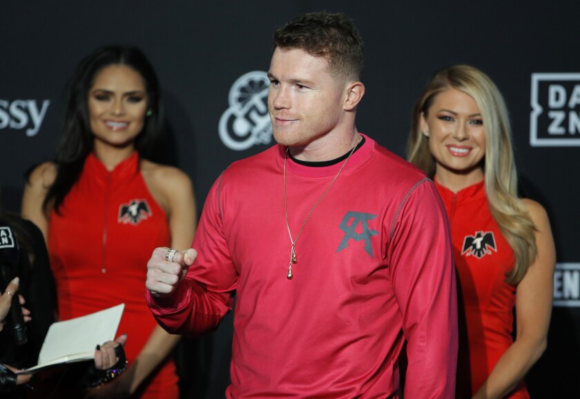 Canelo Alvarez motions to the crowd during his ceremonial arrival in Las Vegas for his fight against Sergey Kovalev in a WBO light-heavyweight title bout on Saturday.