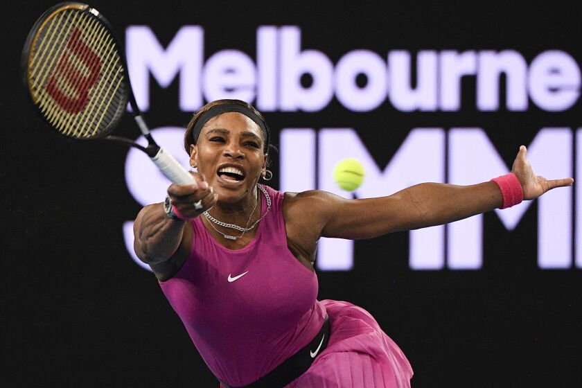 United States' Serena Williams makes a forehand return to compatriot Danielle Collins during a tuneup.