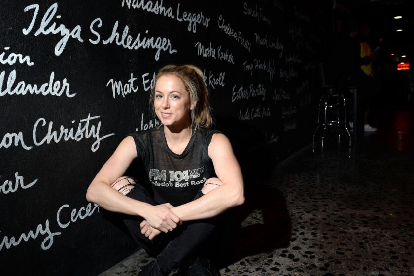 Iliza Shlesinger, one of the hardest working stand-up comics in the business, hangs out with her Pomeranian mix "Blanche" before performing at The Comedy Store in Los Angeles Friday evening, October 12, 2017. (Axel Koester/ For the Los Angeles Times)