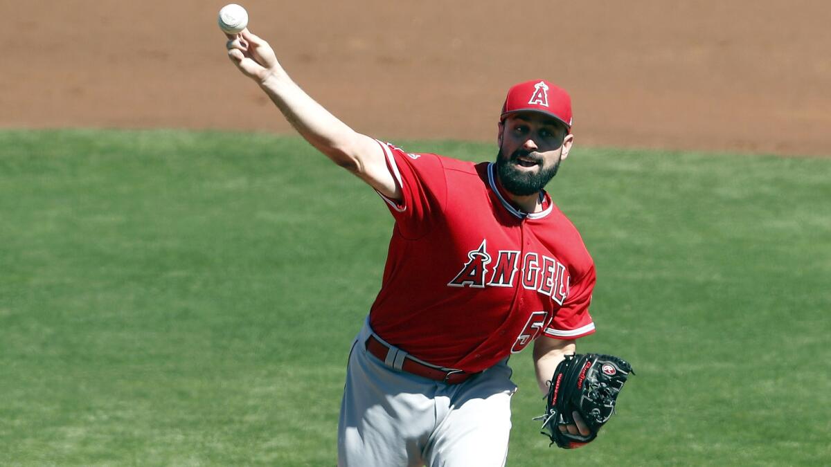 Angels starter Matt Shoemaker delivers a pitch against the Indians during a spring training game Thursday.
