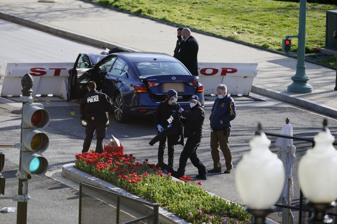 Authorities investigate the scene.