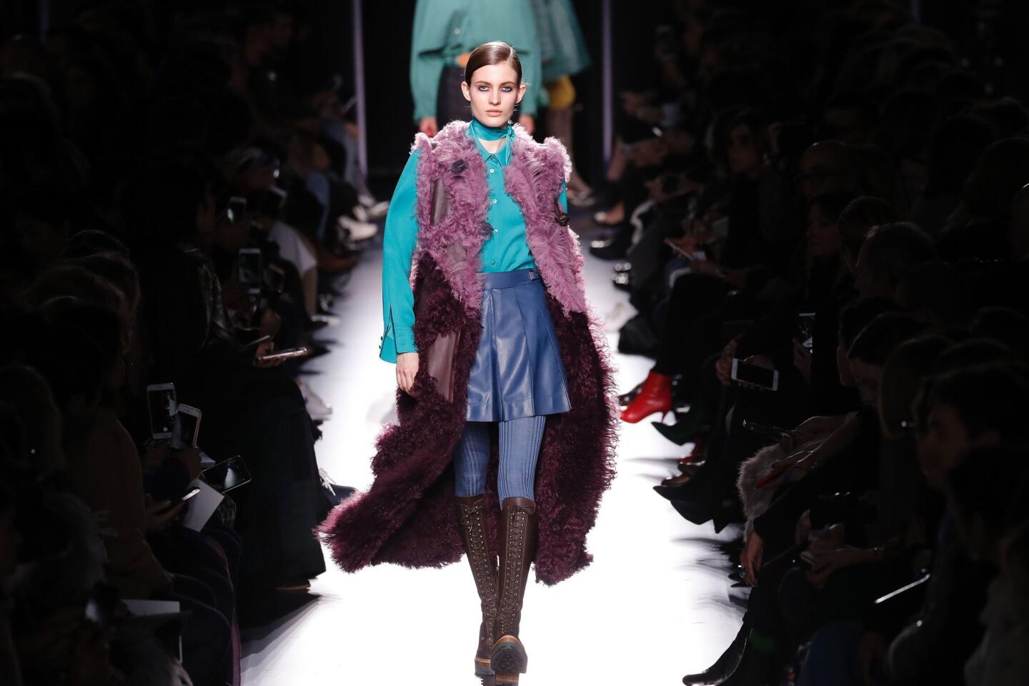 Models walk the runway at the Louis Vuitton Autumn Winter 2017