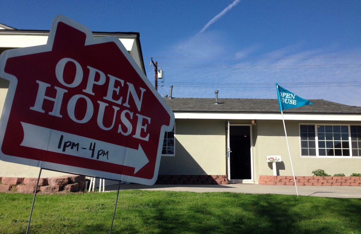 An open house is held at a three-bedroom home for sale in Garden Grove in January; home prices are 16% higher than they ought to be in Orange County, according to Trulia chief economist Jed Kolko.