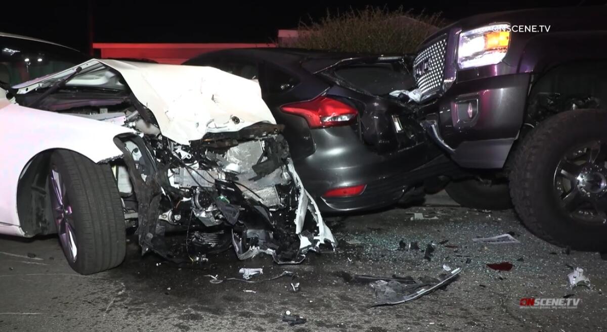 The driver of the white car fled a DUI checkpoint Friday night in Imperial Beach and crashed into several parked vehicles.