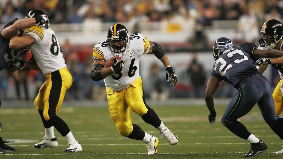 Running back Jerome Bettis (36) of the Pittsburgh Steelers looks for room to run against the Seattle Seahawks in the fourth quarter of the Super Bowl XL at Ford Field on February 5, 2006 in Detroit, Michigan. The Steelers defeated the Seahawks 21-10.