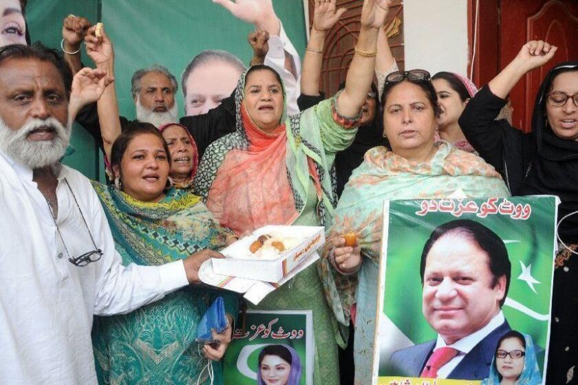 Mandatory Credit: Photo by FAISAL KAREEM/EPA-EFE/REX/Shutterstock (9886842b) Supporters of convicted former Prime Minister Nawaz Sharif celebrate after a court ordered his release, in Multan, Pakistan, 19 September 2018. The Islamabad High Court on 19 September ordered the release of the former Pakistani prime minister Nawaz Sharif, and suspended a 10-year prison sentence he had been serving for corruption charges. An anti-corruption tribunal had sentenced Sharif to 10 years in prison and Maryam to a five-year term in a case involving the purchase of luxury apartments in the United Kingdom, while her husband was given a one-year sentence for obstructing justice. Court ordered release of former PM Sharif, Multan, Pakistan - 19 Sep 2018 ** Usable by LA, CT and MoD ONLY **