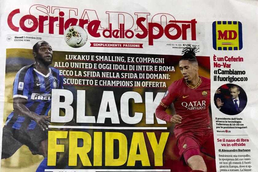 The front page of the Italian sports daily, Corriere dello Sport, Thursday, Dec. 5, 2019. A leading Italian sports daily is facing criticism for a headline reading “Black Friday” and featuring two black soccer players on the cover. Corriere dello Sport on Thursday ran photos of Roma defender Chris Smalling and Inter Milan striker Romelu Lukaku ahead Friday's match between the teams in Milan on Friday. (AP Photo/Fabio Polimeni)