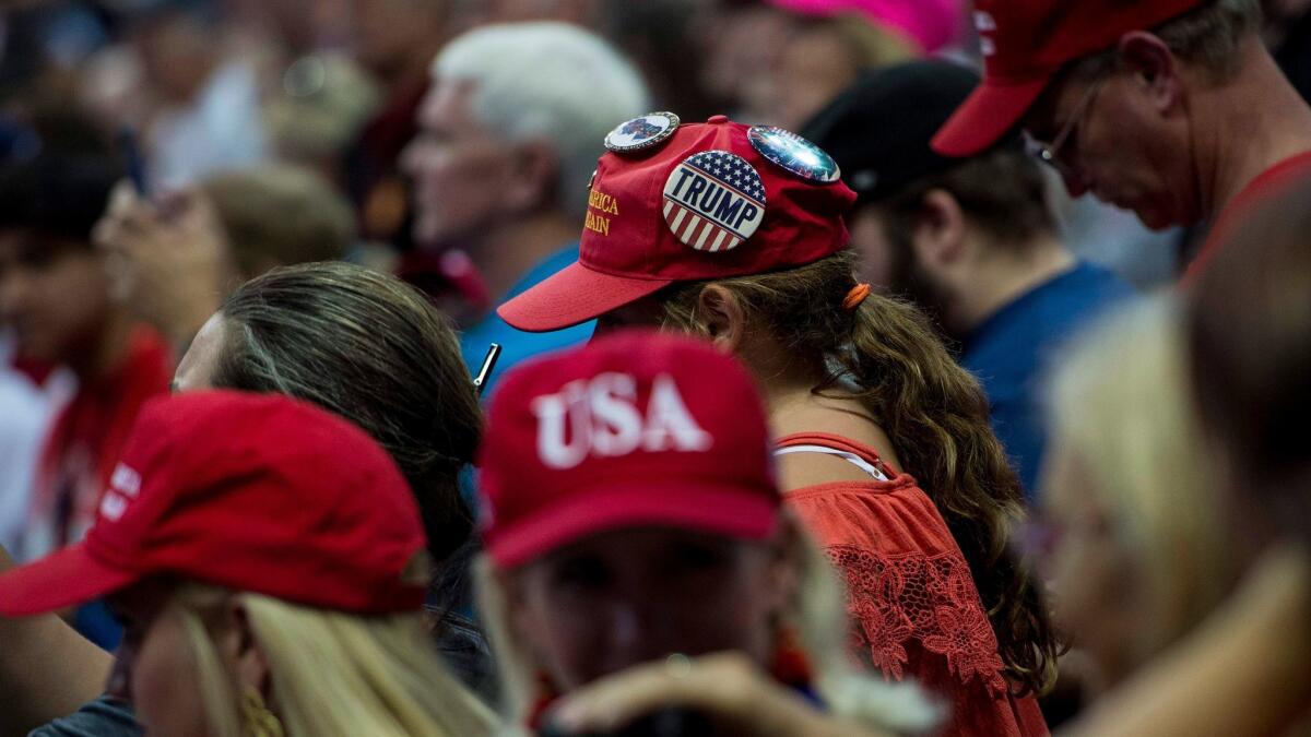 Supporters of President Trump listen to him speak during a Sept. 22 rally for Sen. Luther Strange (R-Ala.) in Huntsville, Ala.