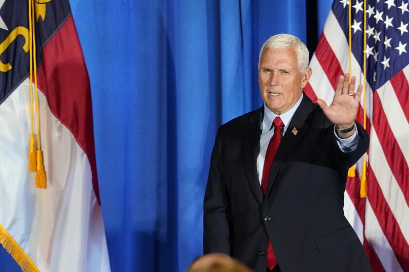 Republican presidential candidate former Vice President Mike Pence waves after speaking during the North Carolina Republican Party Convention in Greensboro, N.C., Saturday, June 10, 2023. (AP Photo/Chuck Burton)