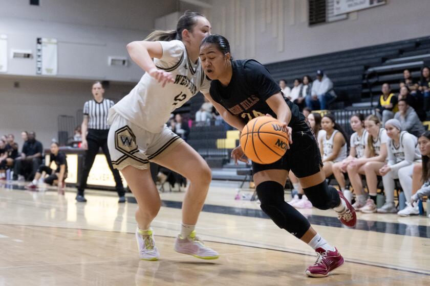 San Diego, CA - January 26: Mission Hills girls basketball senior guard Kyara Walter dribbles the ball during an away game against Westview High School Friday, Jan. 26, 2024, in San Diego, CA. (Luke Johnson / For The San Diego Union-Tribune)