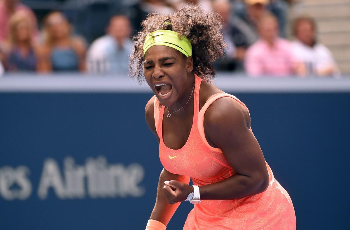 Serena Williams celebrates a point during her 2015 U.S. Open women's singles semifinals match against Roberta Vinci on Friday. Vinci won the game.