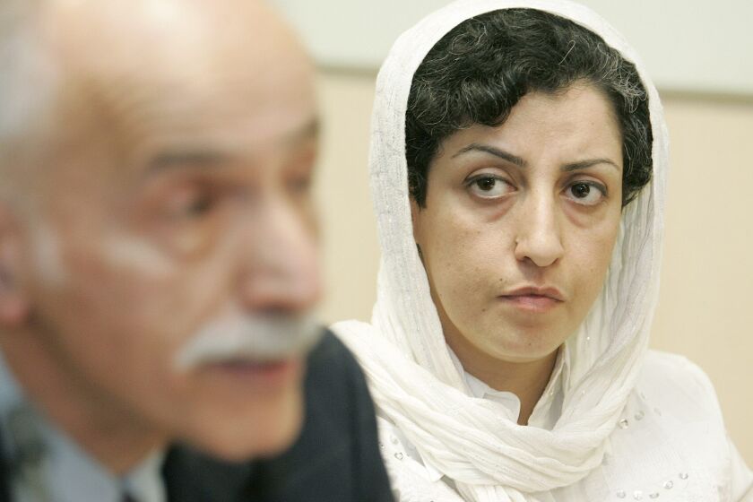 Narges Mohammadi, right, attends a news conference in Geneva in 2008.