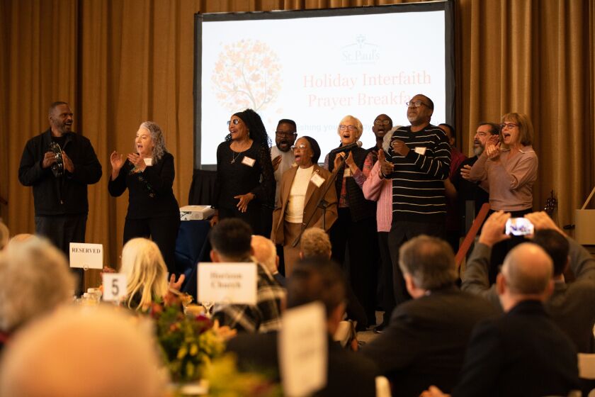 The Martin Luther King, Jr. Community Choir performs during the Holiday Interfaith Prayer Breakfast at St. Paul’s Conference Center in Bankers Hill on Thursday, Nov. 17, 2022.