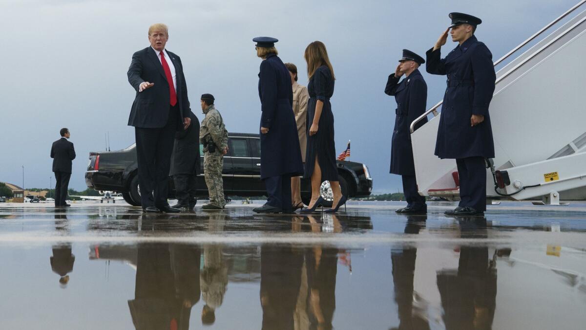 President Trump arrives Joint Base Andrews in Maryland on Sunday after returning from his New Jersey golf club.