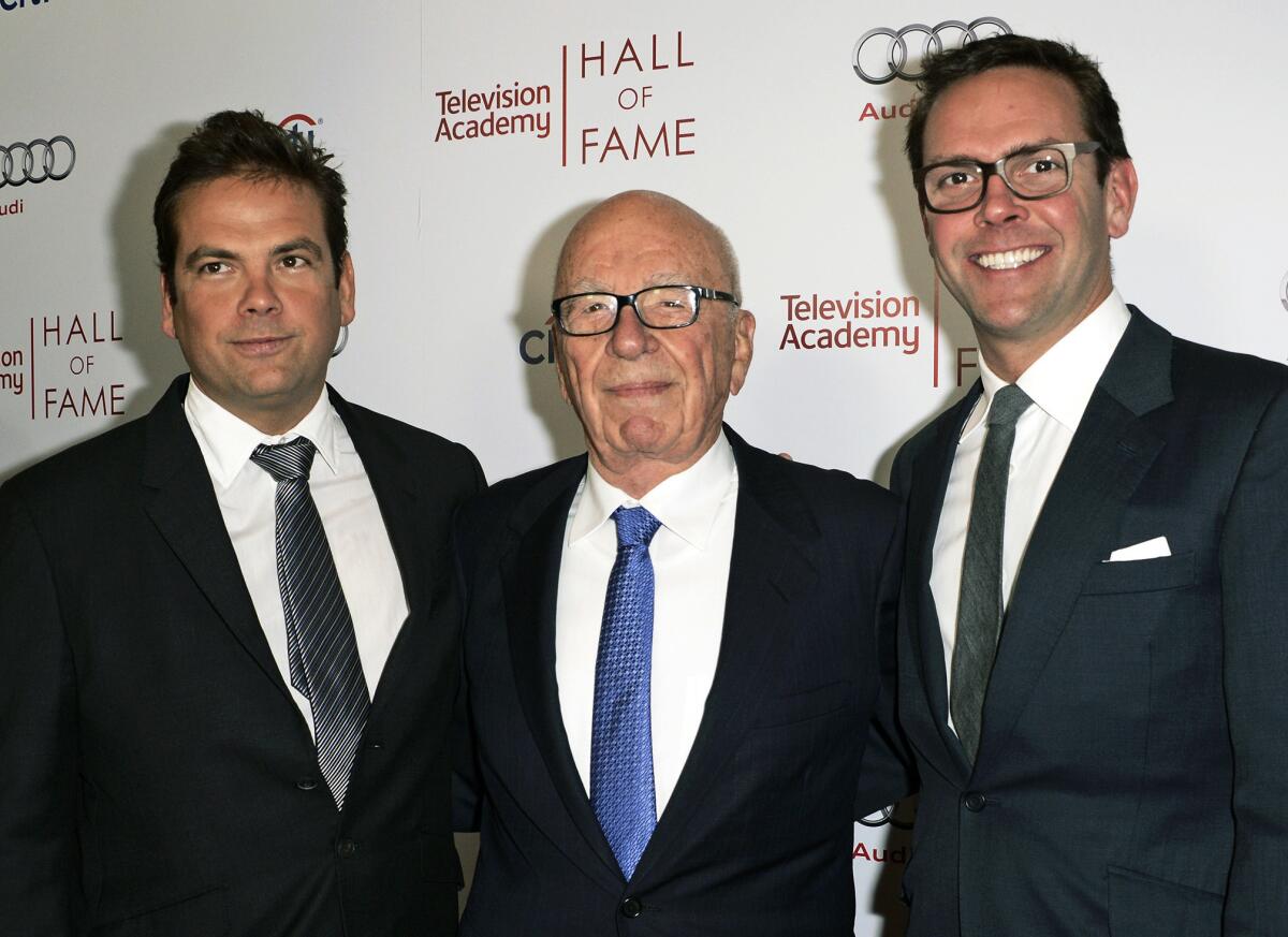 21st Century Fox Executive Chairman Rupert Murdoch, center, and his sons, Lachlan, left, and James Murdoch at the 2014 Television Academy Hall of Fame in Beverly Hills.