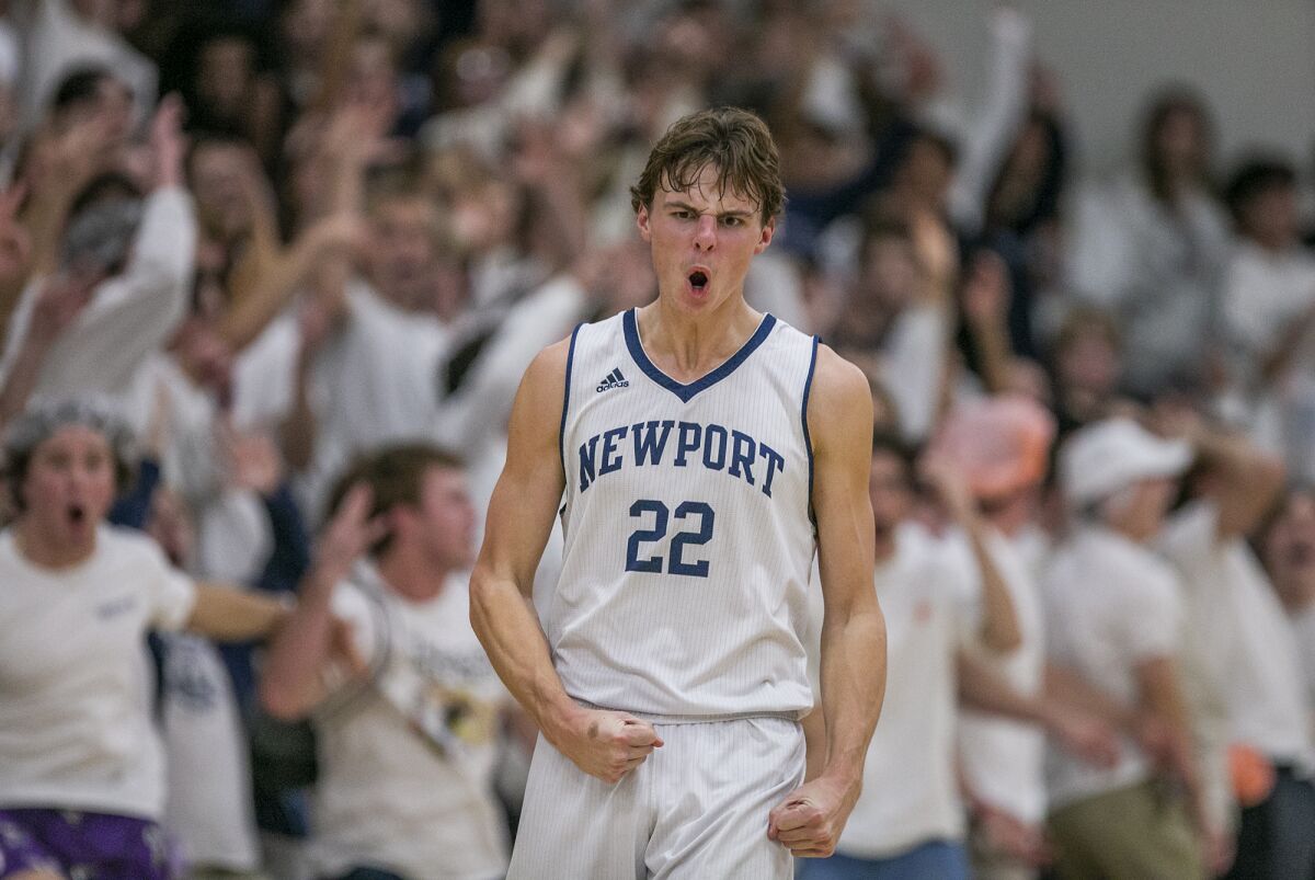 Newport Harbor's Riggs Guy celebrates during the first Battle of the Bay game against Corona del Mar on Wednesday.