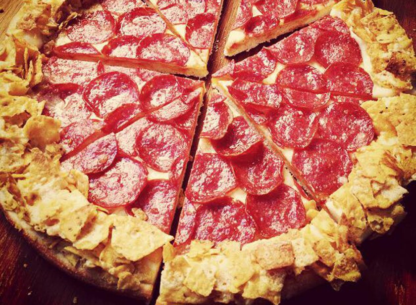 Pizza Hut Is Making A Doritos Crunchy Crust Pizza Covered In