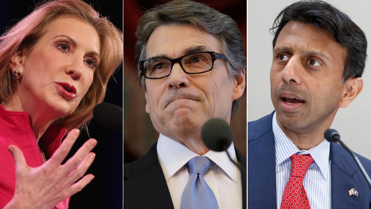 Former Hewlett-Packard Chief Executive Carly Fiorina, Texas Gov. Rick Perry, and Louisiana Gov. Bobby Jindal.