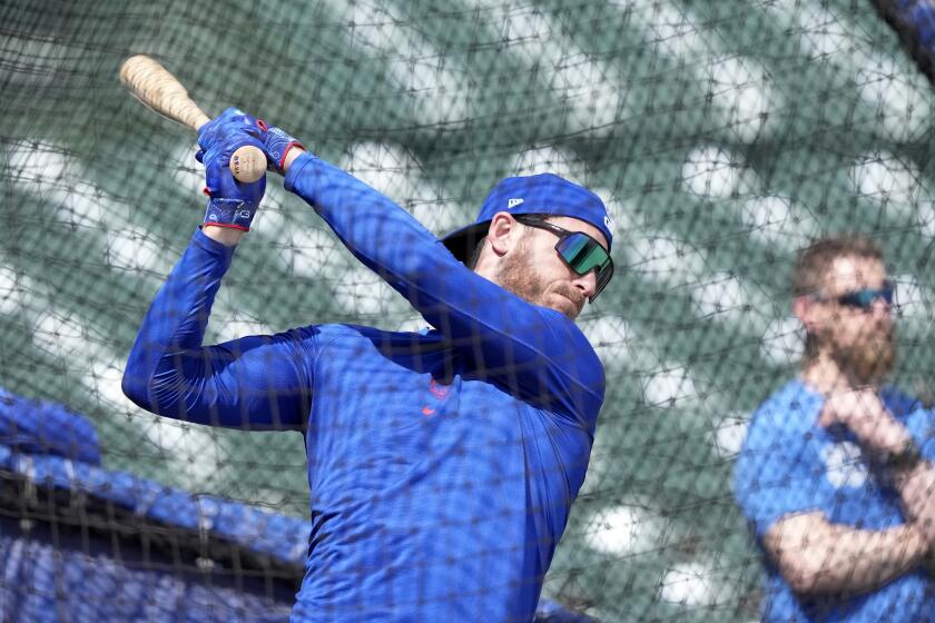 Chicago Cubs' Cody Bellinger takes batting practice before the team's baseball game against the Milwaukee Brewers Saturday, May 4, 2024, in Chicago. (AP Photo/Charles Rex Arbogast)