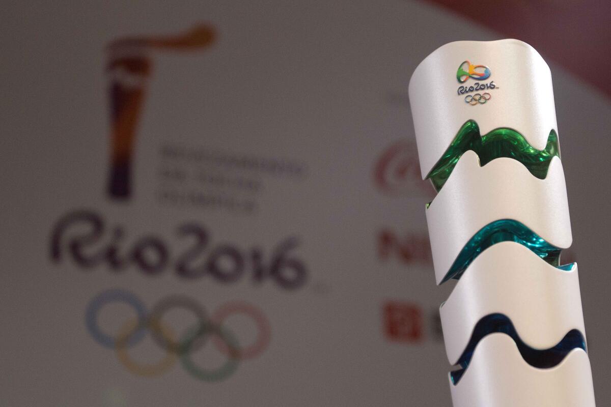 The 2016 Rio de Janeiro Games torch stands on display during its presentation ceremony on Friday in Brasilia, Brazil.