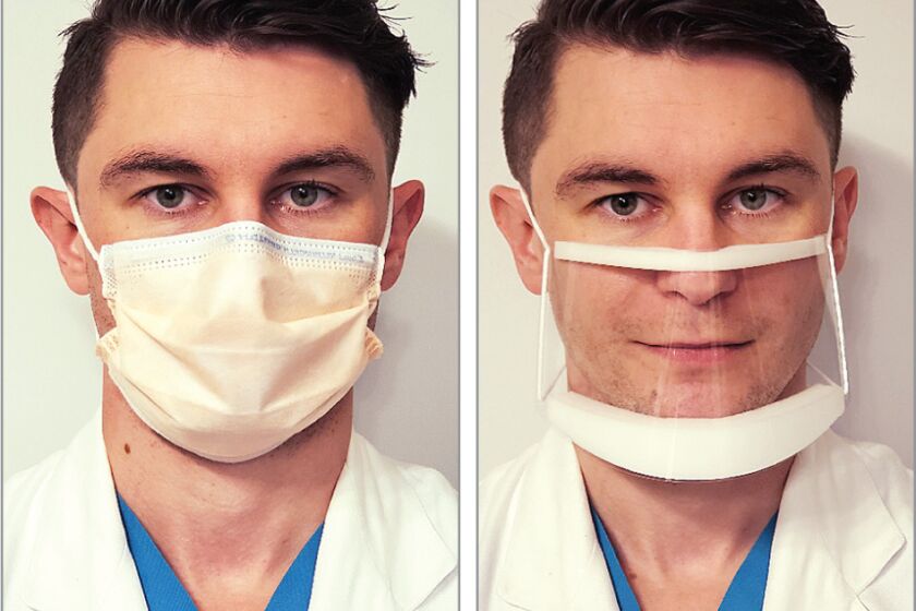 Dr. Ian Kratzke models the traditional and clear face masks that were tested in a new study.