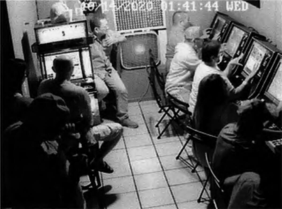 Surveillance footage seen inside a suspected illegal gambling parlor on Euclid Avenue in San Diego.