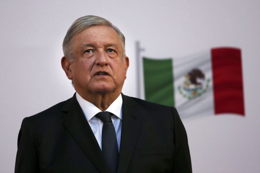 FILE - In this Dec. 1, 2020 file photo, Mexican President Andrés Manuel López Obrador attends the commemoration of his second anniversary in office at the National Palace in Mexico City. One day after Mexico’s Attorney General’s Office announced it was dropping the drug trafficking case against its former defense secretary, López Obrador said Friday, Jan. 15, 2020 that the U.S. Drug Enforcement Administration had “fabricated” the accusations against retired Gen. Salvador Cienfuegos. (AP Photo/Marco Ugarte, File)