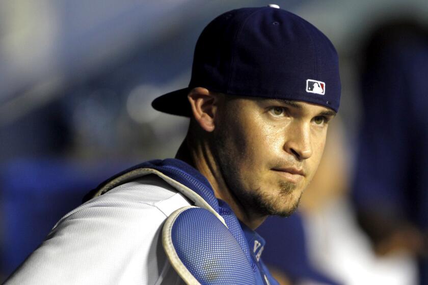 Dodgers catcher Yasmani Grandal has one hit and four strikeouts in eight playoff at-bats against the Mets.