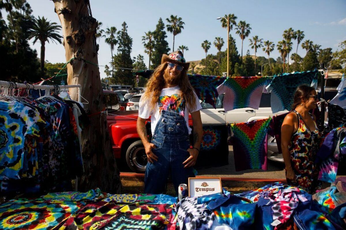 Brandon Lee Campbell of Interstellar Dye was among the many vendors selling tie-dye shirts in a parking lot outside of the Hollywood Bowl before the Dead & Company concert in early June.