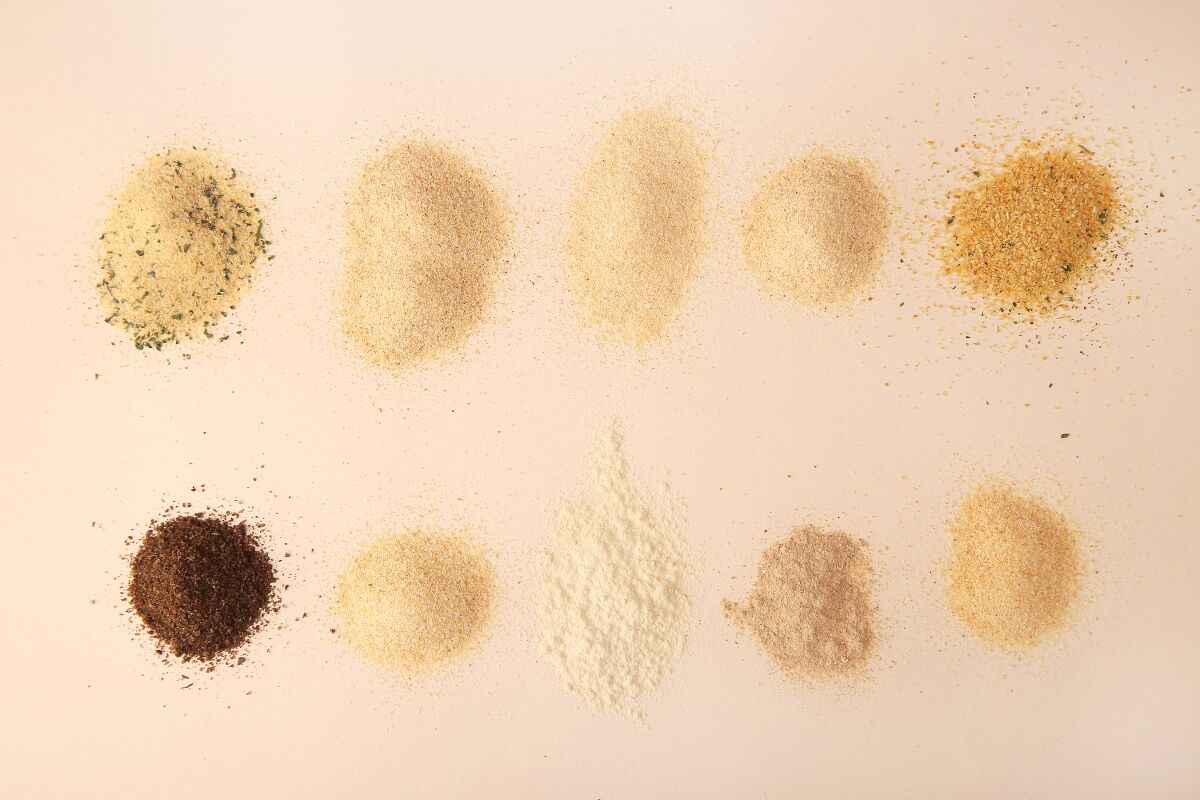 Ten varieties of garlic powder, of various shades and textures