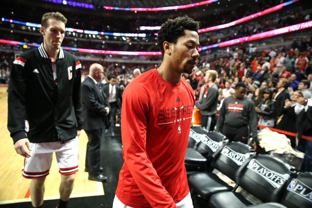 Chicago Bulls guard Derrick Rose walks off the court after losing to the Cleveland Cavaliers. (Chris Sweda/Chicago Tribune)