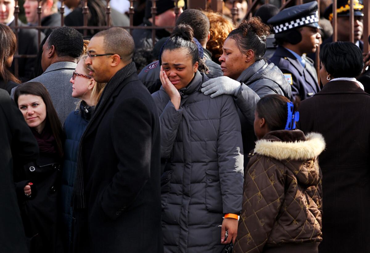 Mourners gather outside Chicago's Greater Harvest Baptist Church before the funeral for 15-year-old Hadiya Pendleton on Saturday.