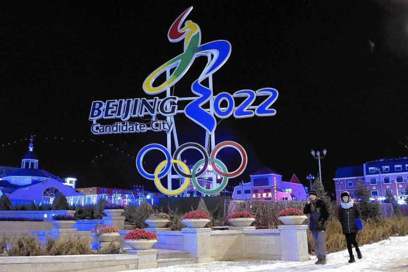 Beijing's logo for its bid to get the 2022 Winter Olympics is displayed in Zhangjiakou.