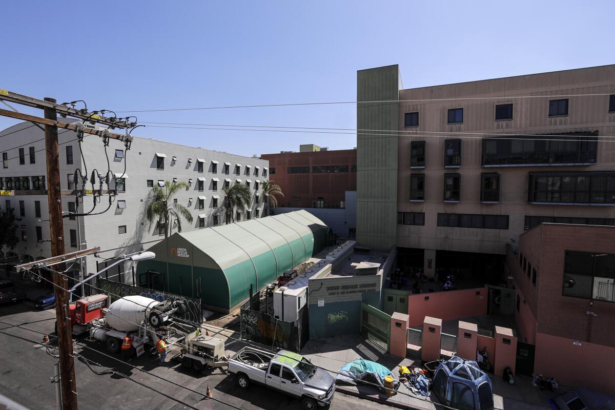 A tent at Union Rescue Mission became an impromptu triage center as Housing for Health