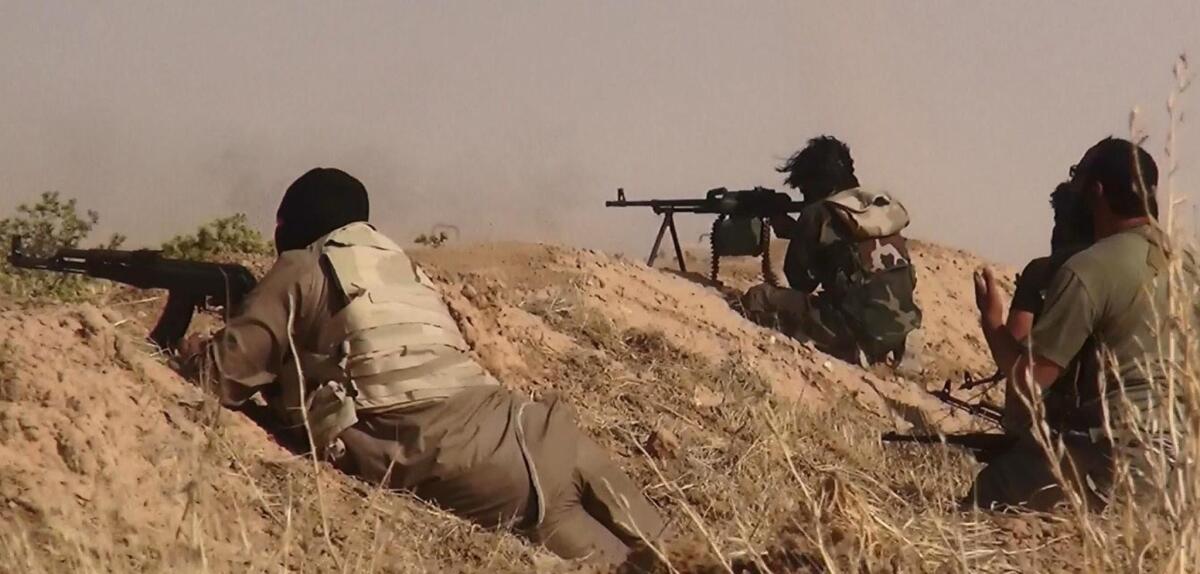 An image posted on the Twitter account of the militant Al Baraka news on June 13 purports to show Islamic State of Iraq and Syria fighters clashing with Iraqi soldiers at an undisclosed location close to the Iraqi-Syrian border. In primarily Shiite Muslim Iran, citizens are worried about the advance of the Sunni Muslim fighters.