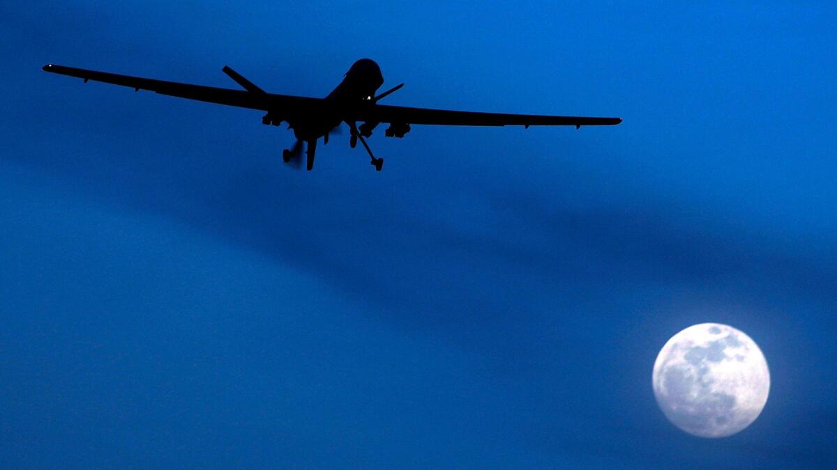 An unmanned U.S. Predator drone flies over Kandahar Air Field, southern Afghanistan on Jan. 31, 2010.