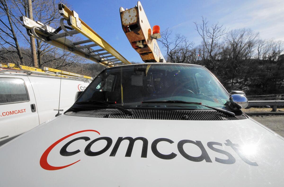 Comcast Corp. added 315,000 high-speed Internet service customers during the third quarter, which more than offset the loss of 81,000 cable television customers. Above, a Comcast installation truck in Pittsburgh.
