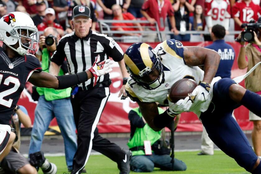 Rams cornerback Trumaine Johnson (22) intercepts a pass in the end zone intended for Arizona Cardinals receiver John Brown (12) during a game Oct. 2.