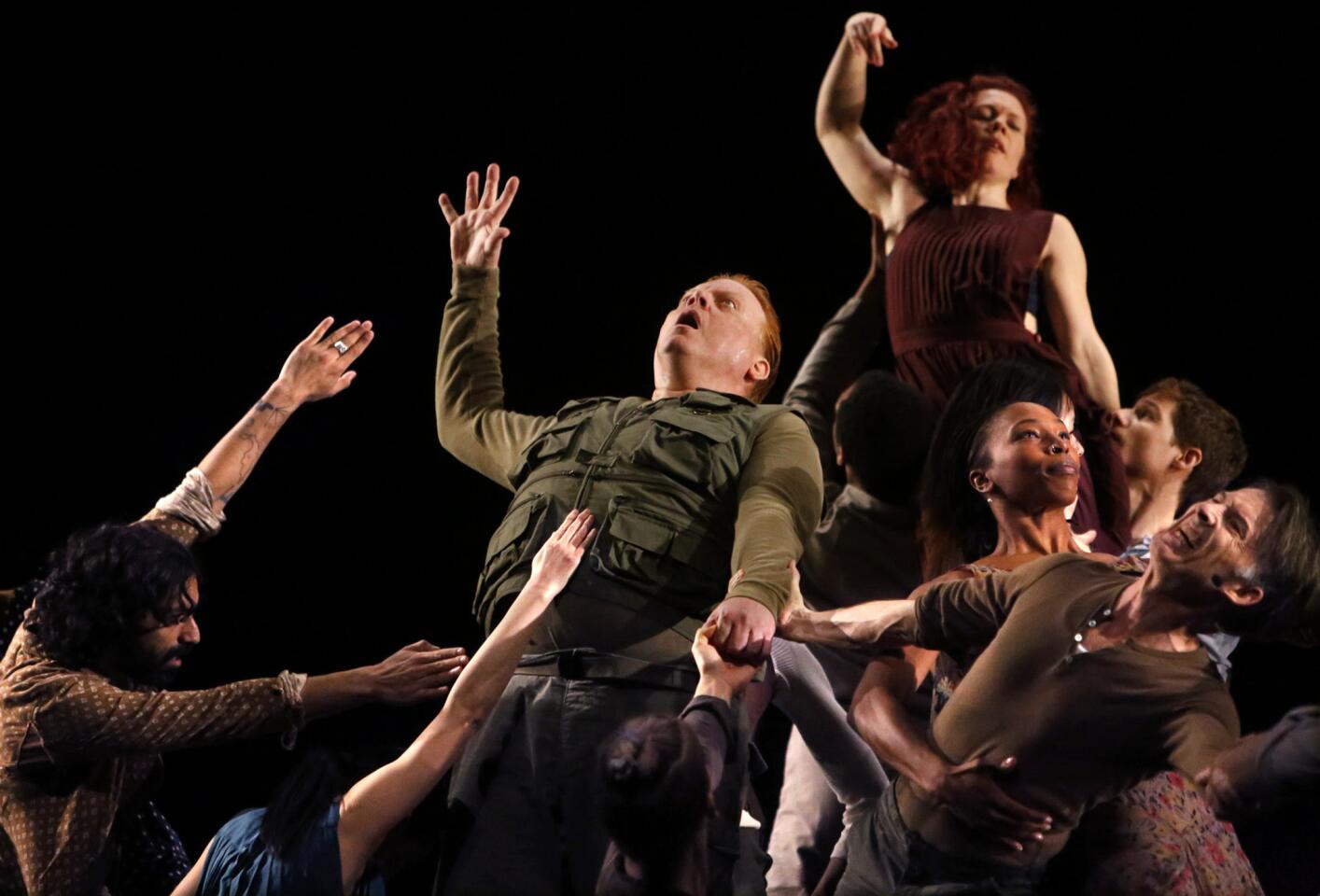 Dancers perform in a dress rehearsal of Bill T. Jones/Arnie Zane Dance Company & SITI Company's "A Rite," in honor of Stravinsky's "Rite of Spring."