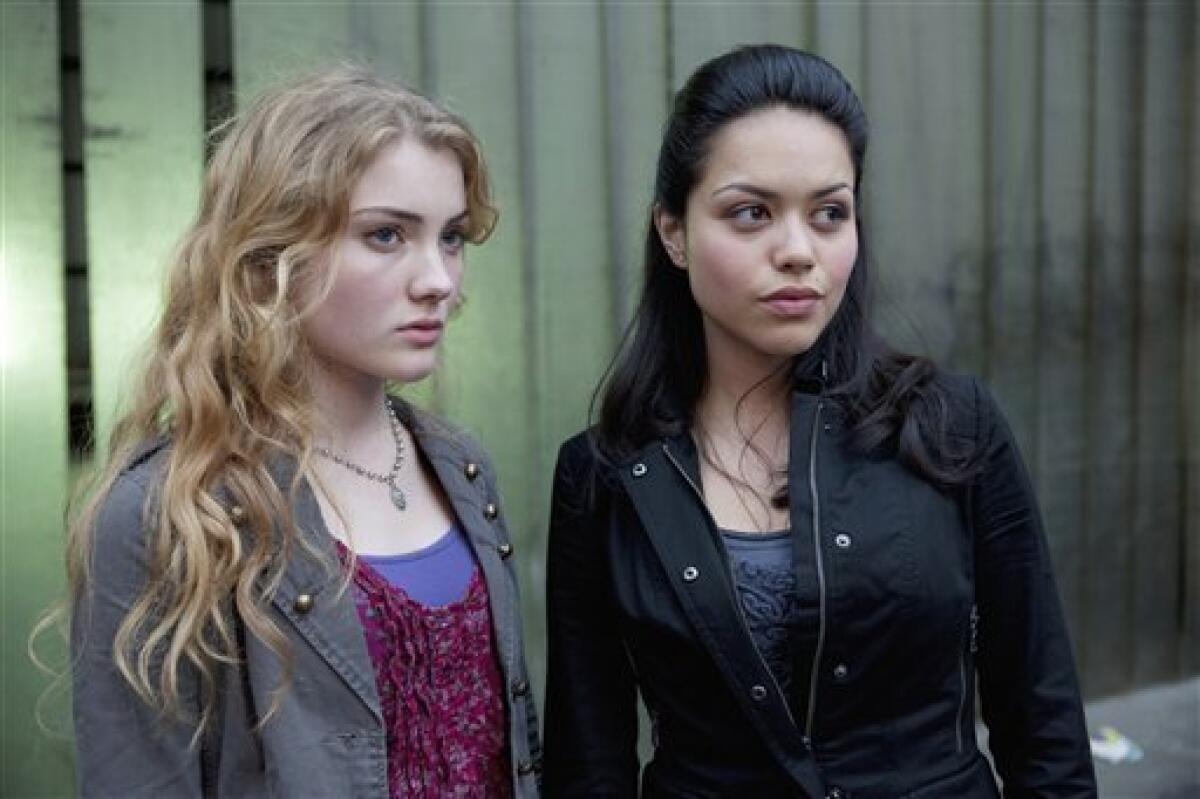 In this publicity image released by ABC Family, Skyler Samuels, left, and Alyssa Diaz are shown in a scene from "The Nine Lives of Chloe King," a new series premiering Tuesday, June 14, 2011, at 9:00p.m. EST on ABC Family. (AP Photo/ABC Family, Bruce Birmelin)