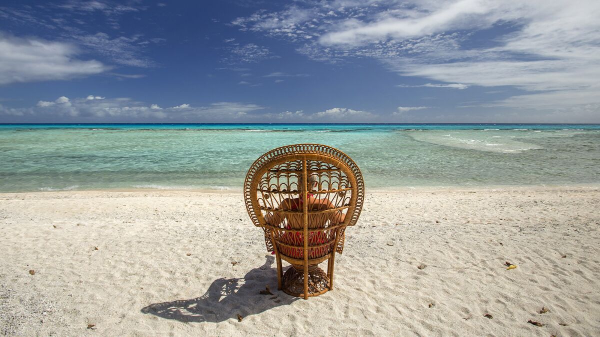 Relaxing on the beach in Rangiroa, French Polynesia.