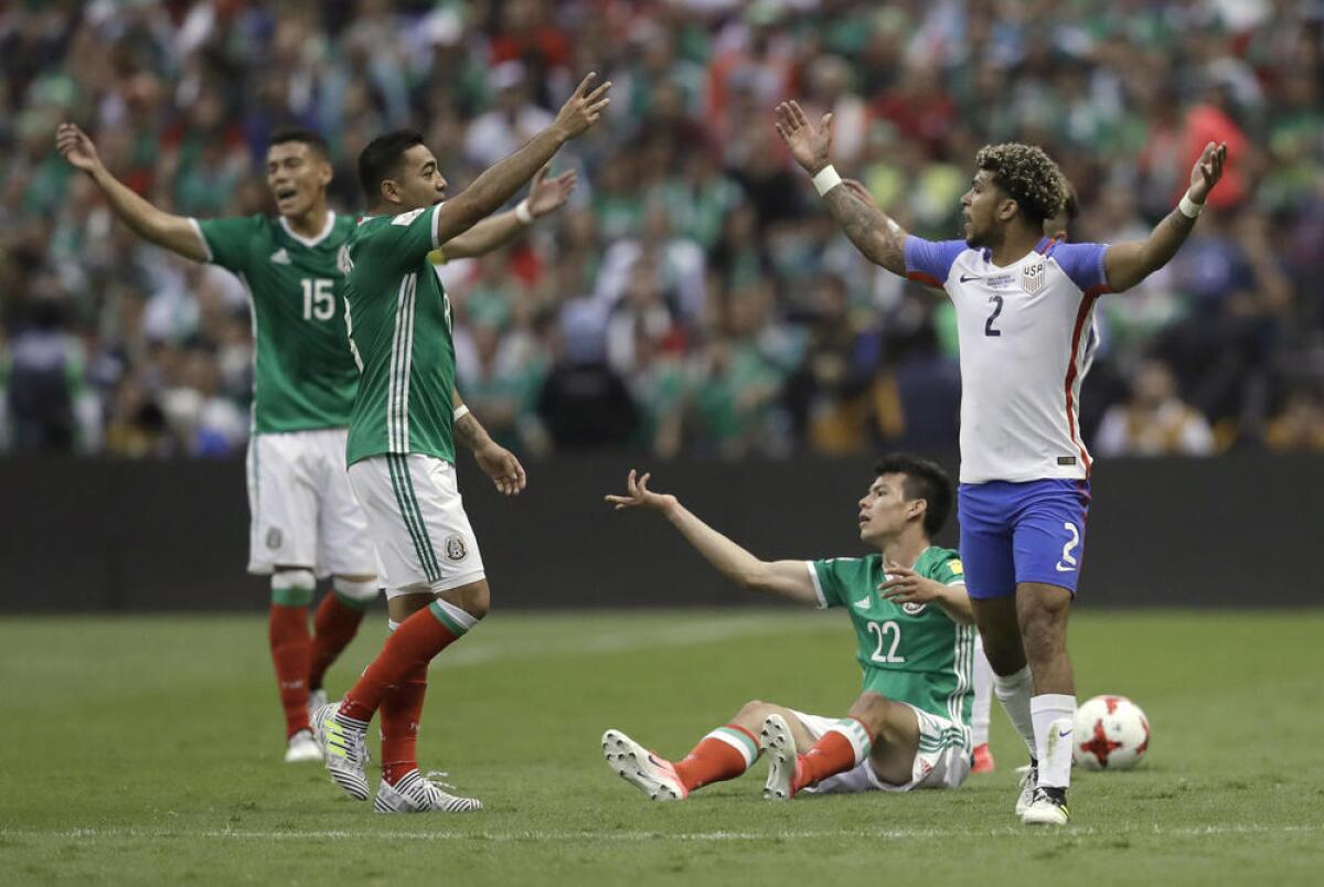 Mexico players react to a foul committed by DeAndre Yedlin of the U.S.